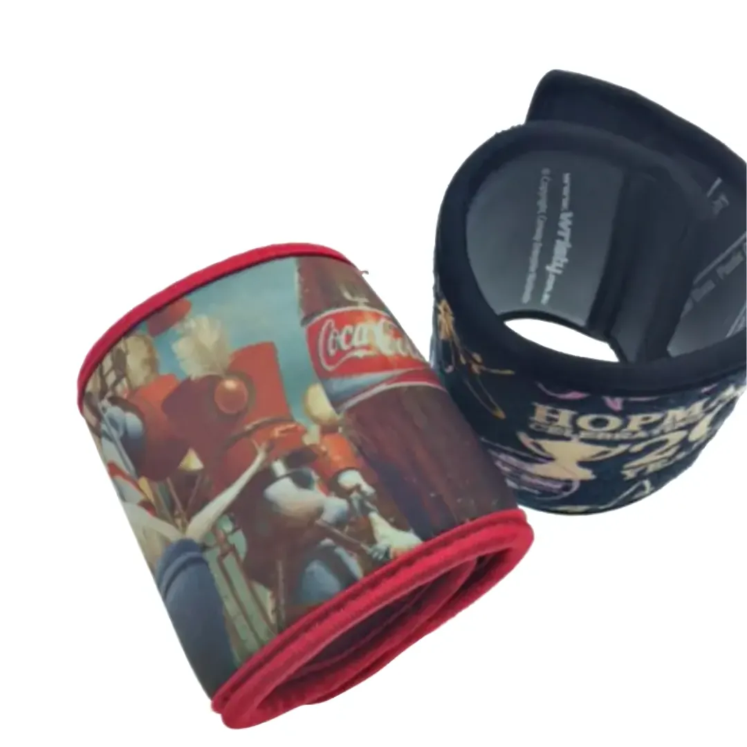 The Stubby Cooler Wrap features two fabric wristbands with a Coca-Cola theme with a marching band, while the other boasts Hopkins Live.