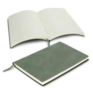 Two green diaries, one open with lined pages and one closed, featuring ribbon bookmarks.