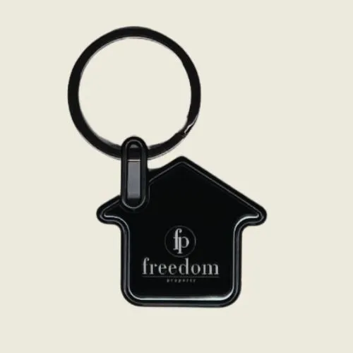 branded house shaped keyring with logo.