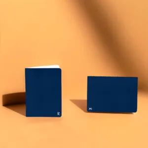 A colorful promotional notebook with a logo on the cover.