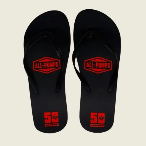 branded black flip flops with logo printed on it.