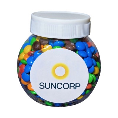 Round jar with colorful candies and a label reading SUNCORP.
