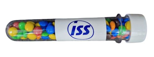 A test tube filled with colorful candy-coated chocolates.
