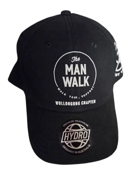 Black cap featuring The Man Walk and Wollongong Chapter logos