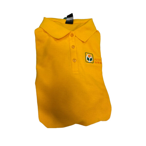 Folded yellow workwear polo shirt with logo