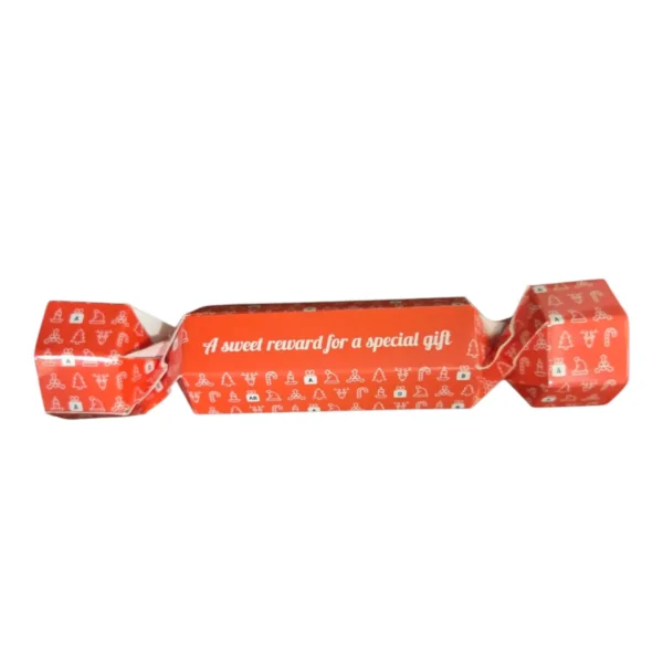 candy in an orange wrap with text printed on it