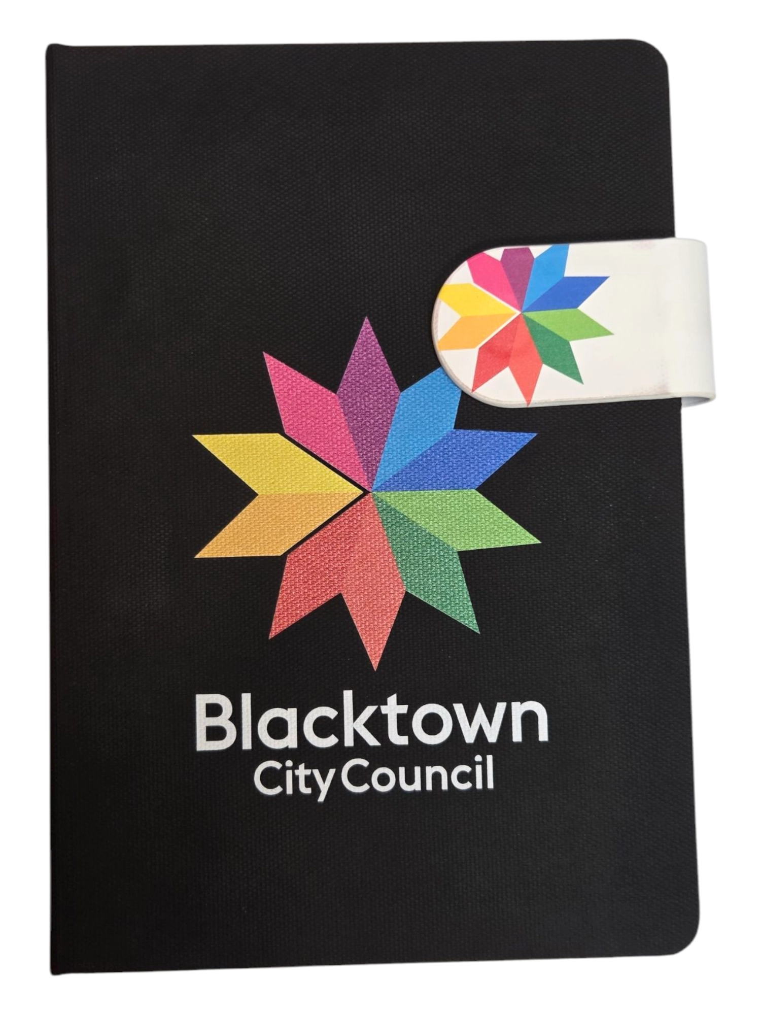 Black notebook with a colorful star, ideal for corporate gifts or branded promotional materials.