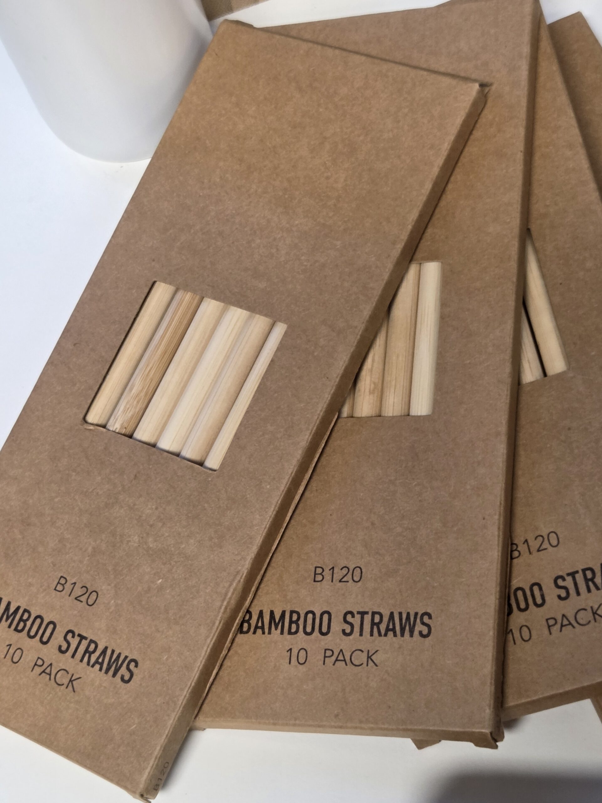Three packs of bamboo straws from Cubic Promote in brown packaging, perfect for July 2025.