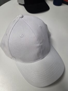 What’s Inside a Promotional Cap? We Cut Open Two to Find Out
