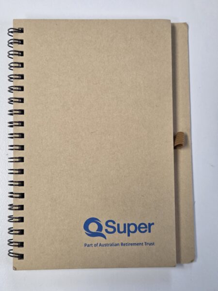 Brown spiral notebook with QSuper logo and branding, placed on a white surface.