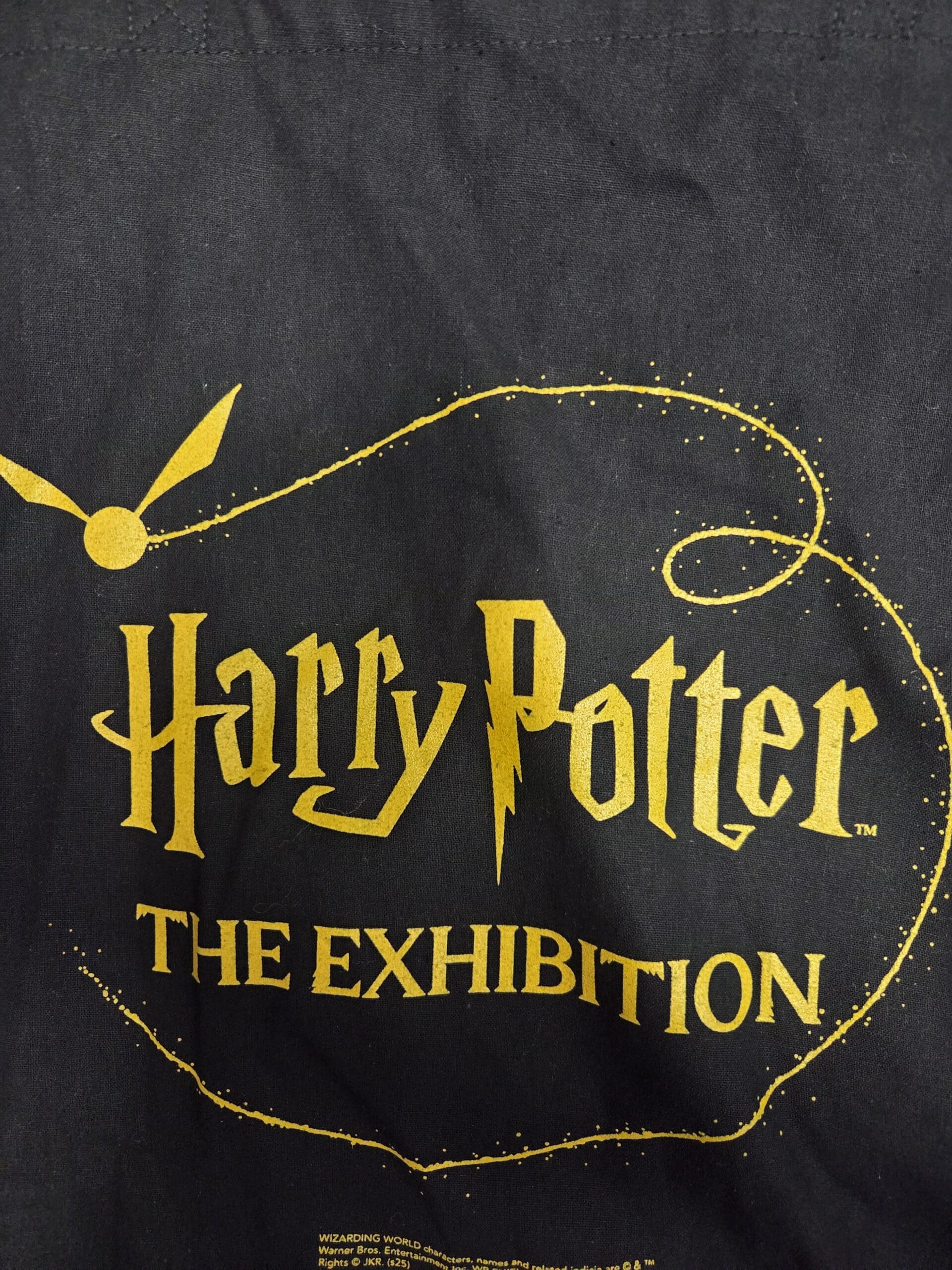 close up of the print on the black tote