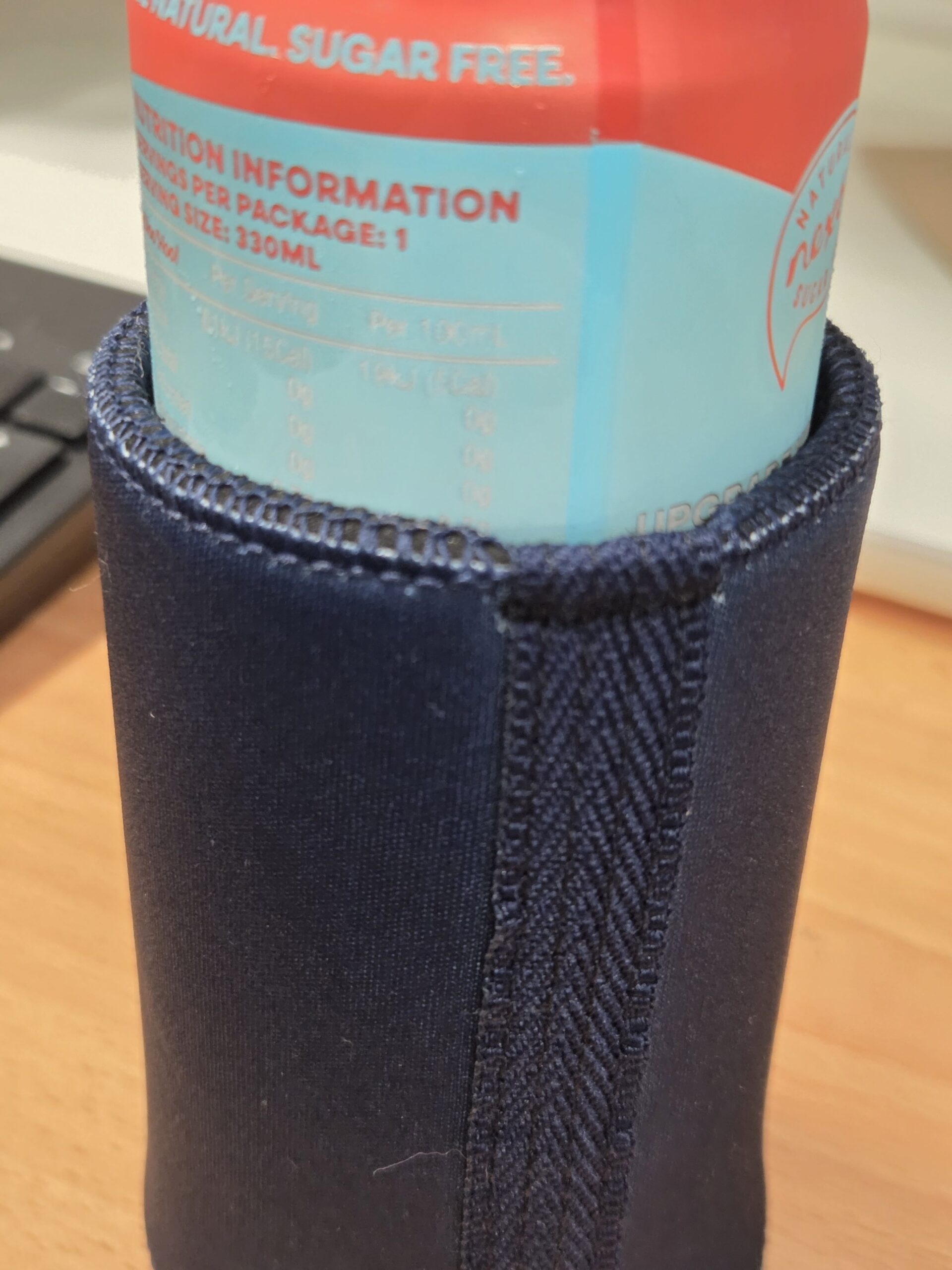 close up view on the stitches of the stubby cooler