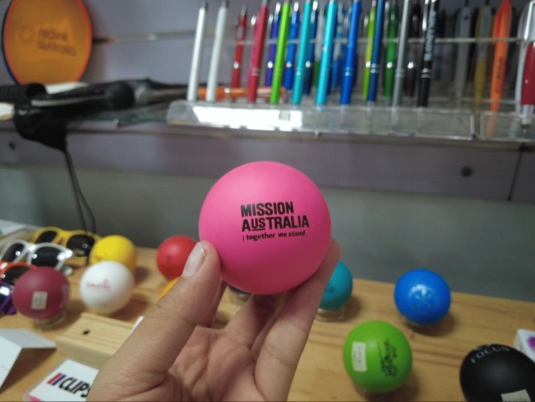 pink stressball with Mission Australia logo
