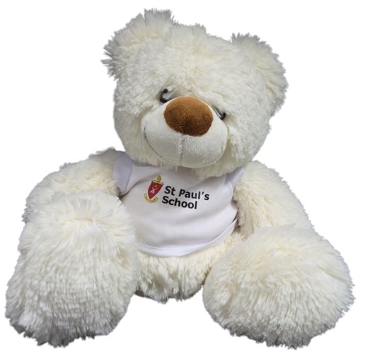Fluffy white teddy bear wearing a St Pauls School shirt—one of the funnest promotional items.
