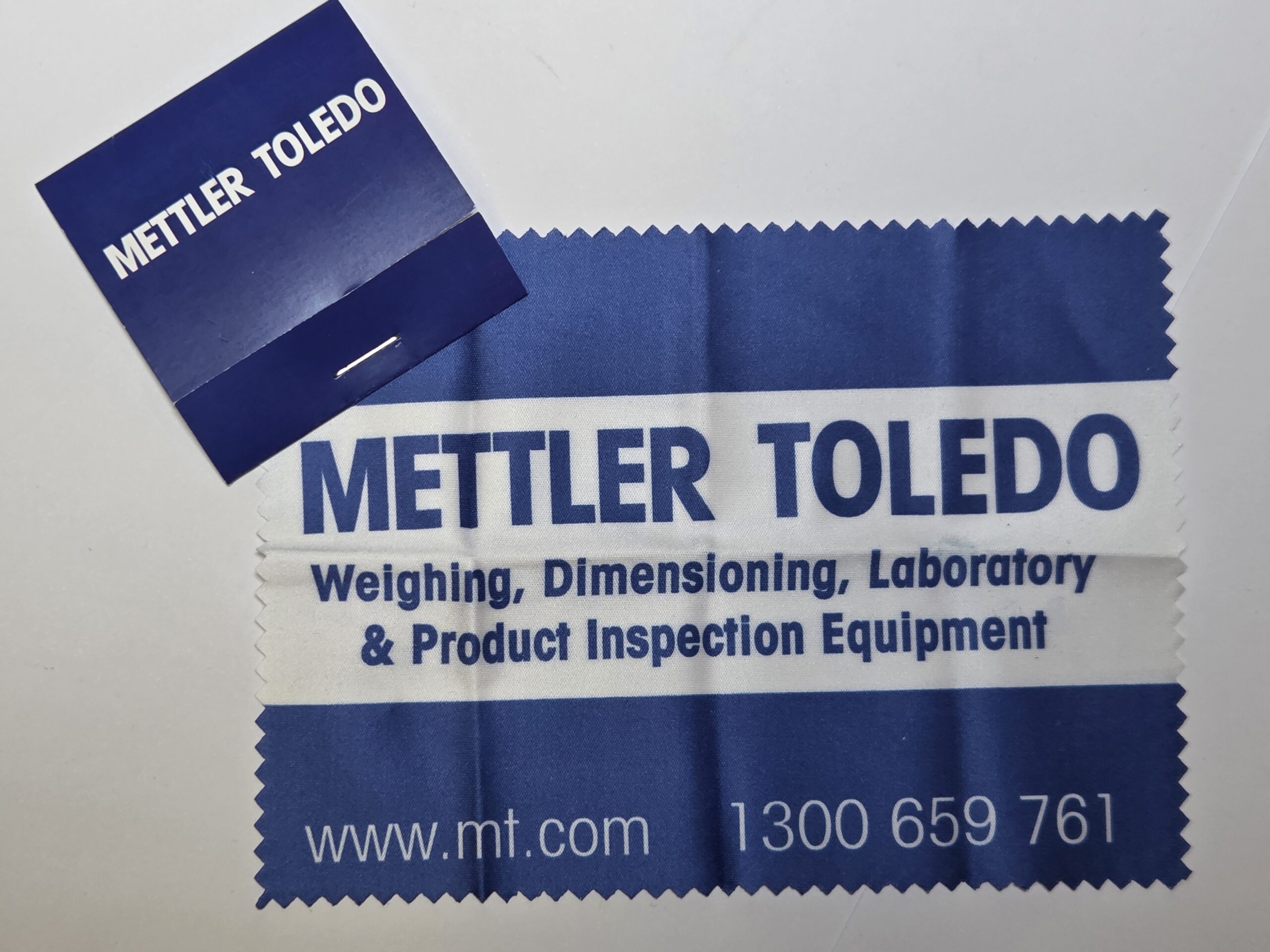 Blue Mettler Toledo cloth and card for lab equipment, available in Australia.