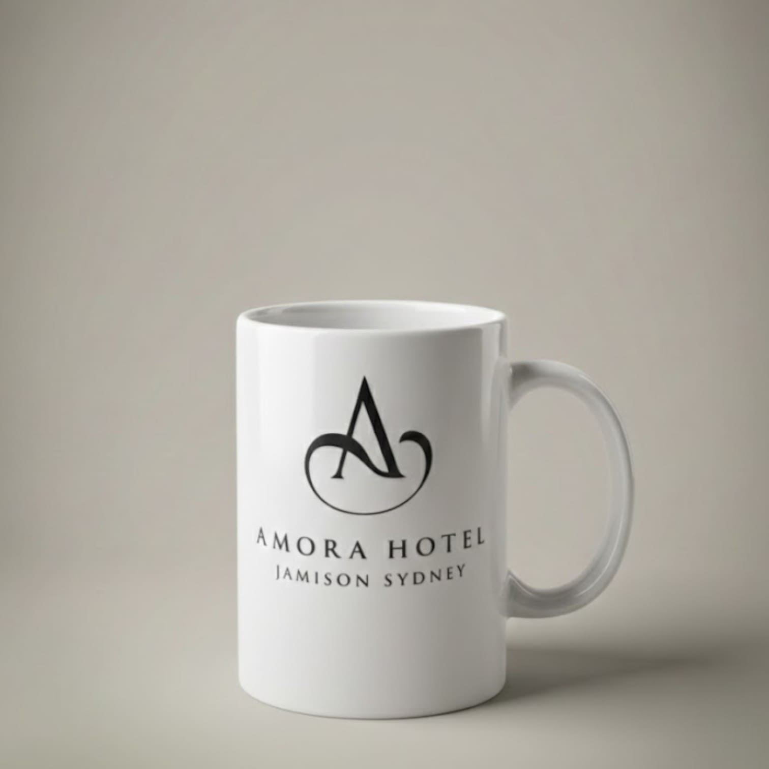 White mug with Amora Hotel Jamison Sydney, ideal for Australian B2B Promo Packs.