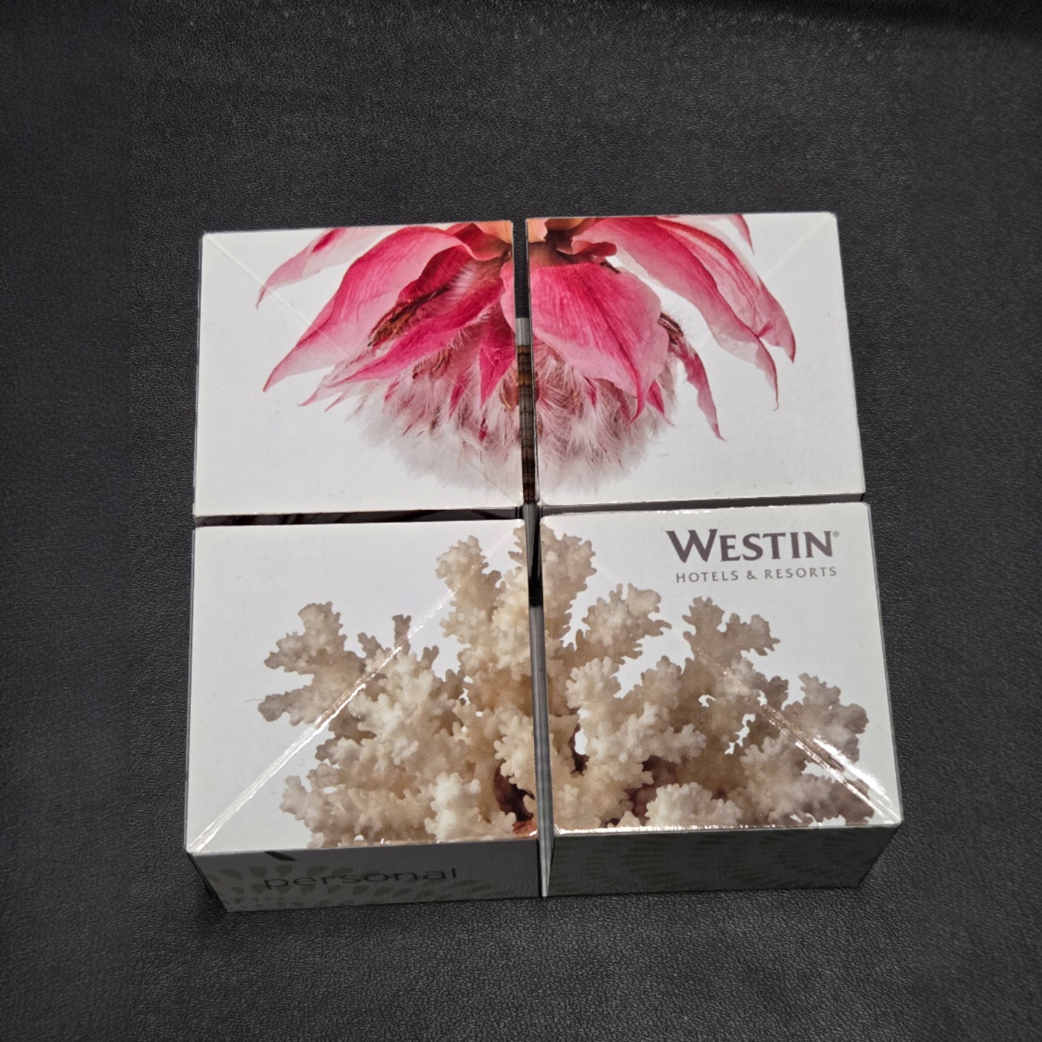 Four cube-shaped boxes with flower and coral images showcase impressive print colour accuracy.