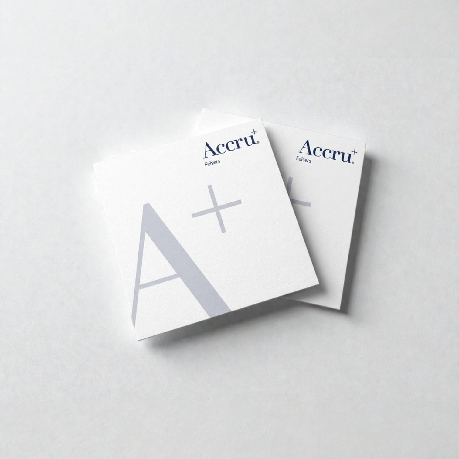 Two square cards overlap, featuring Accru+ for accounting firms in Australia on a light background.