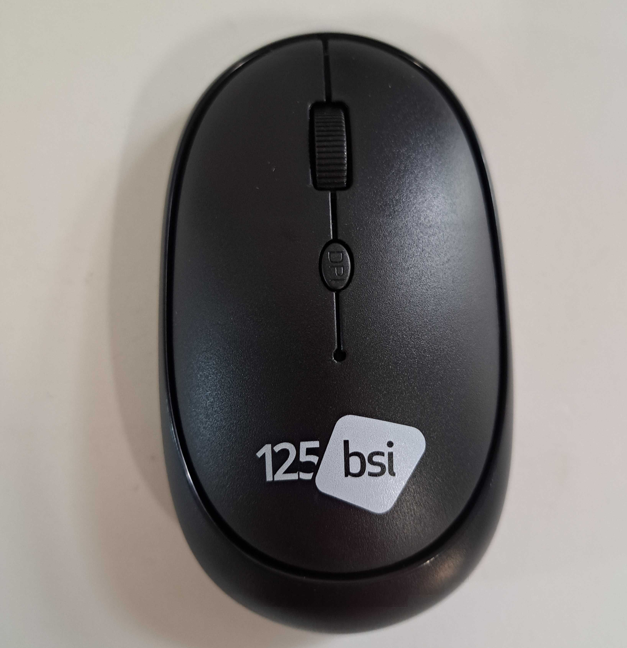 Black wireless computer mouse with British Standards Institution 125 BSI logo on white surface.