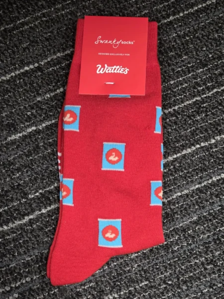 Red socks with blue and red can patterns—perfect event items for age group events.