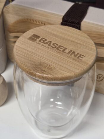 A clear glass jar with a wooden lid labeled BASELINE, perfect for showcasing an EPS or PDF logo.