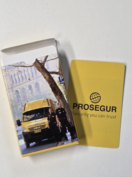 A yellow PROSEGUR card and box, ideal for large gatherings to minimise clean-up