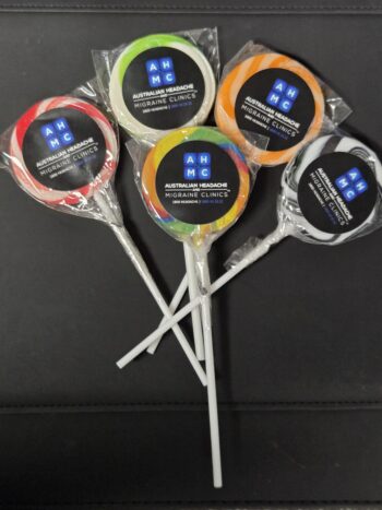 Five colorful lollipops for buyers—Minimum Order Quantities explained on each clinic label.